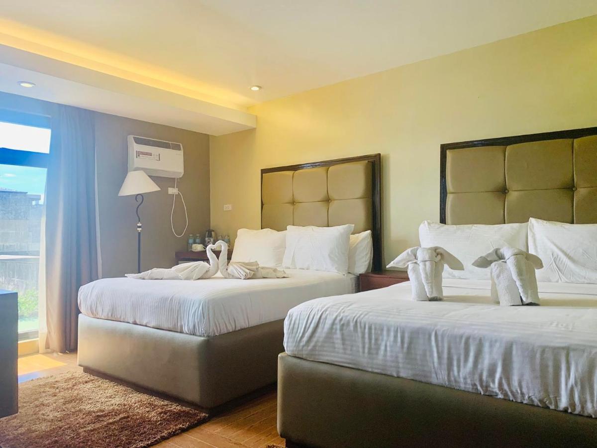 เทรชเชอร์ ไอส์แลนด์ โฮเต็ล วิธ มินิวอเตอร์ แอดเวนเจอร์ Hotel Masbate City ภายนอก รูปภาพ