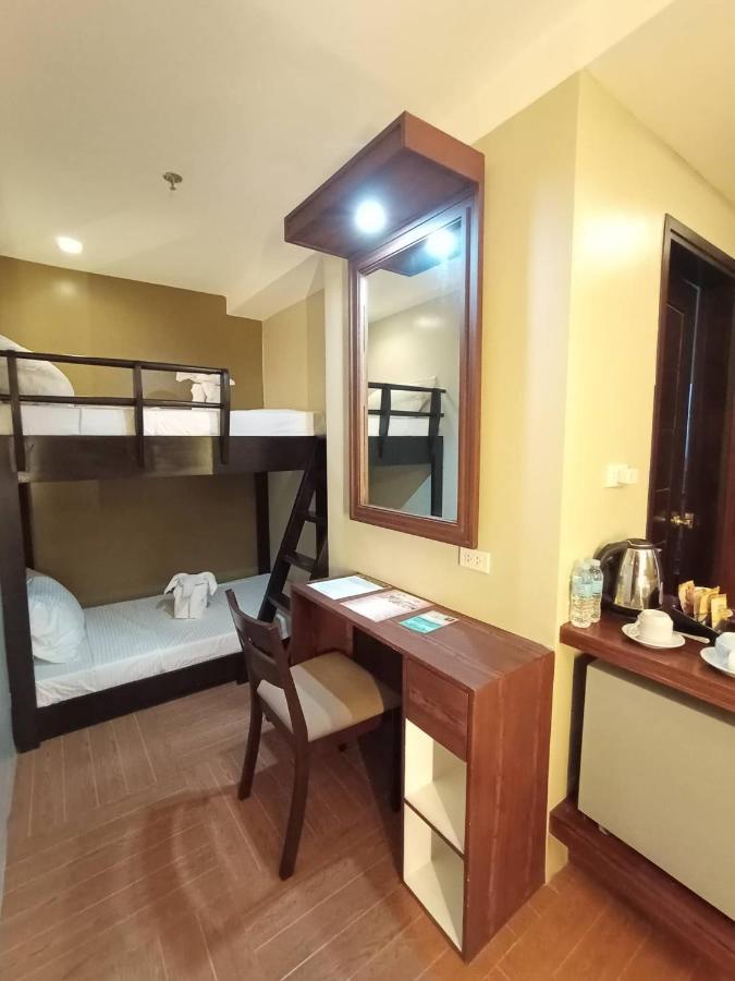 เทรชเชอร์ ไอส์แลนด์ โฮเต็ล วิธ มินิวอเตอร์ แอดเวนเจอร์ Hotel Masbate City ภายนอก รูปภาพ