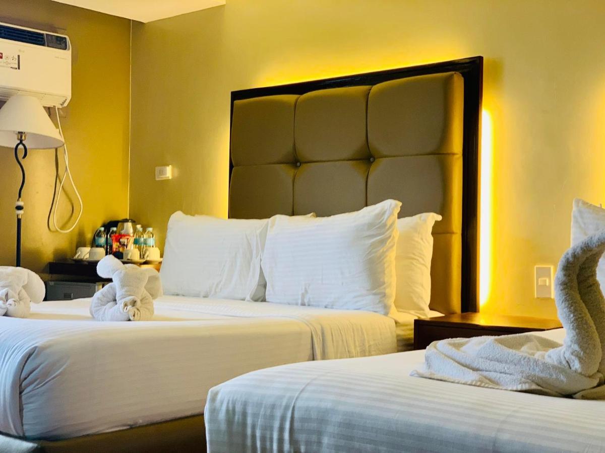 เทรชเชอร์ ไอส์แลนด์ โฮเต็ล วิธ มินิวอเตอร์ แอดเวนเจอร์ Hotel Masbate City ภายนอก รูปภาพ