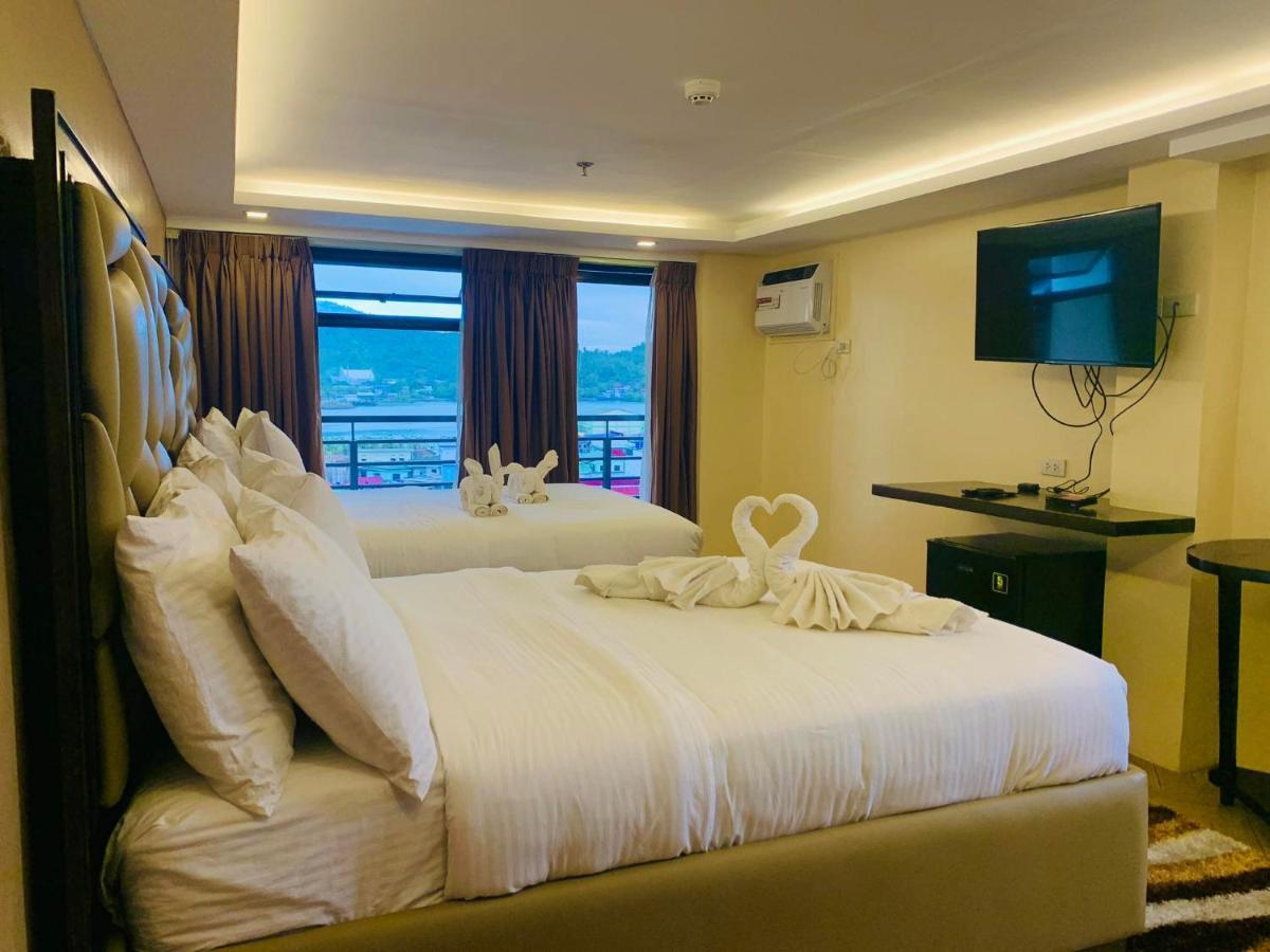 เทรชเชอร์ ไอส์แลนด์ โฮเต็ล วิธ มินิวอเตอร์ แอดเวนเจอร์ Hotel Masbate City ภายนอก รูปภาพ