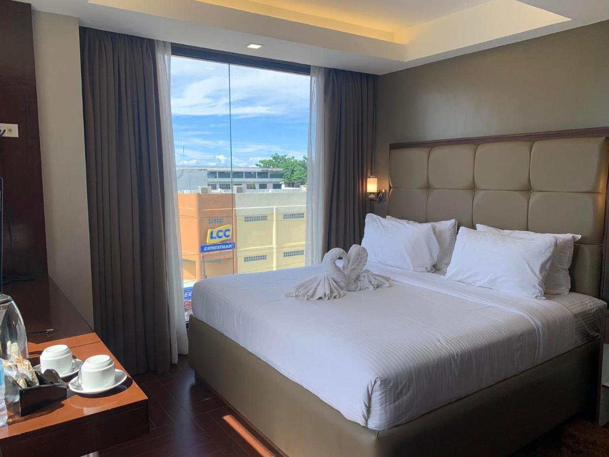 เทรชเชอร์ ไอส์แลนด์ โฮเต็ล วิธ มินิวอเตอร์ แอดเวนเจอร์ Hotel Masbate City ภายนอก รูปภาพ