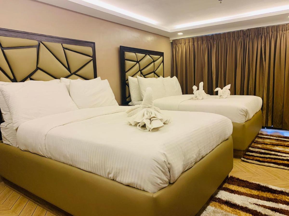 เทรชเชอร์ ไอส์แลนด์ โฮเต็ล วิธ มินิวอเตอร์ แอดเวนเจอร์ Hotel Masbate City ภายนอก รูปภาพ