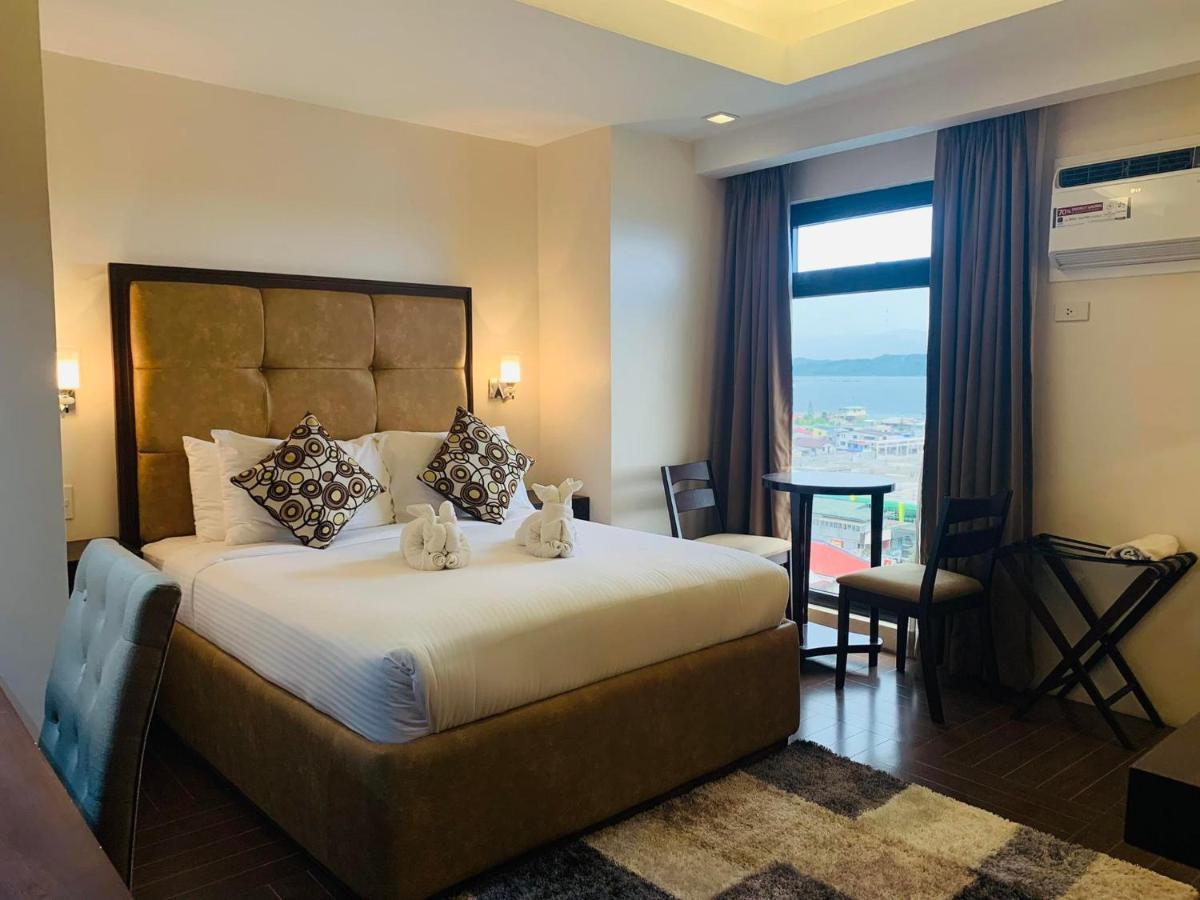 เทรชเชอร์ ไอส์แลนด์ โฮเต็ล วิธ มินิวอเตอร์ แอดเวนเจอร์ Hotel Masbate City ภายนอก รูปภาพ