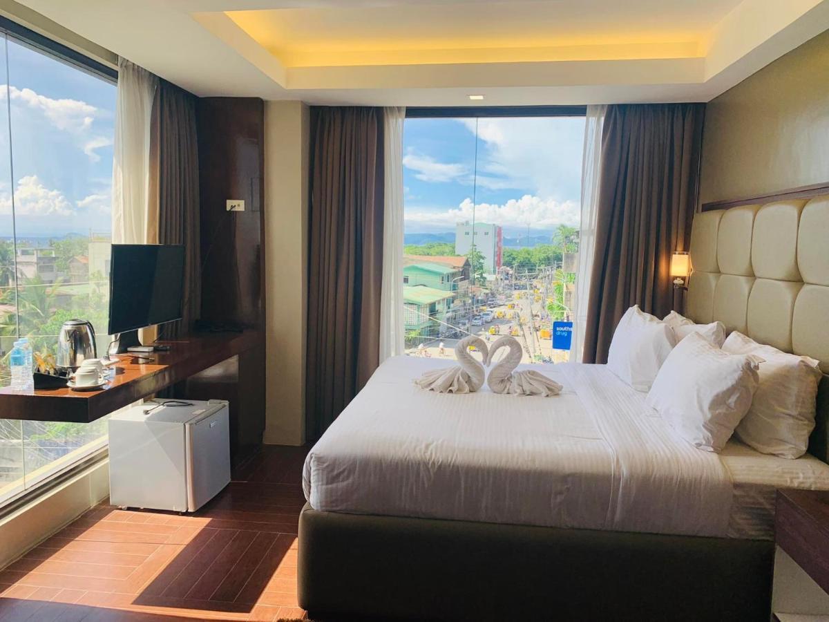 เทรชเชอร์ ไอส์แลนด์ โฮเต็ล วิธ มินิวอเตอร์ แอดเวนเจอร์ Hotel Masbate City ภายนอก รูปภาพ