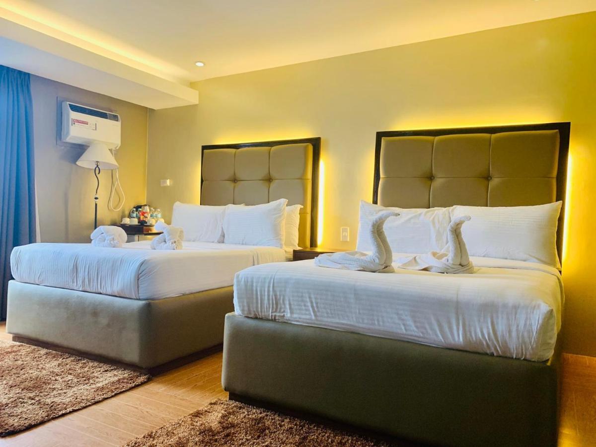 เทรชเชอร์ ไอส์แลนด์ โฮเต็ล วิธ มินิวอเตอร์ แอดเวนเจอร์ Hotel Masbate City ภายนอก รูปภาพ