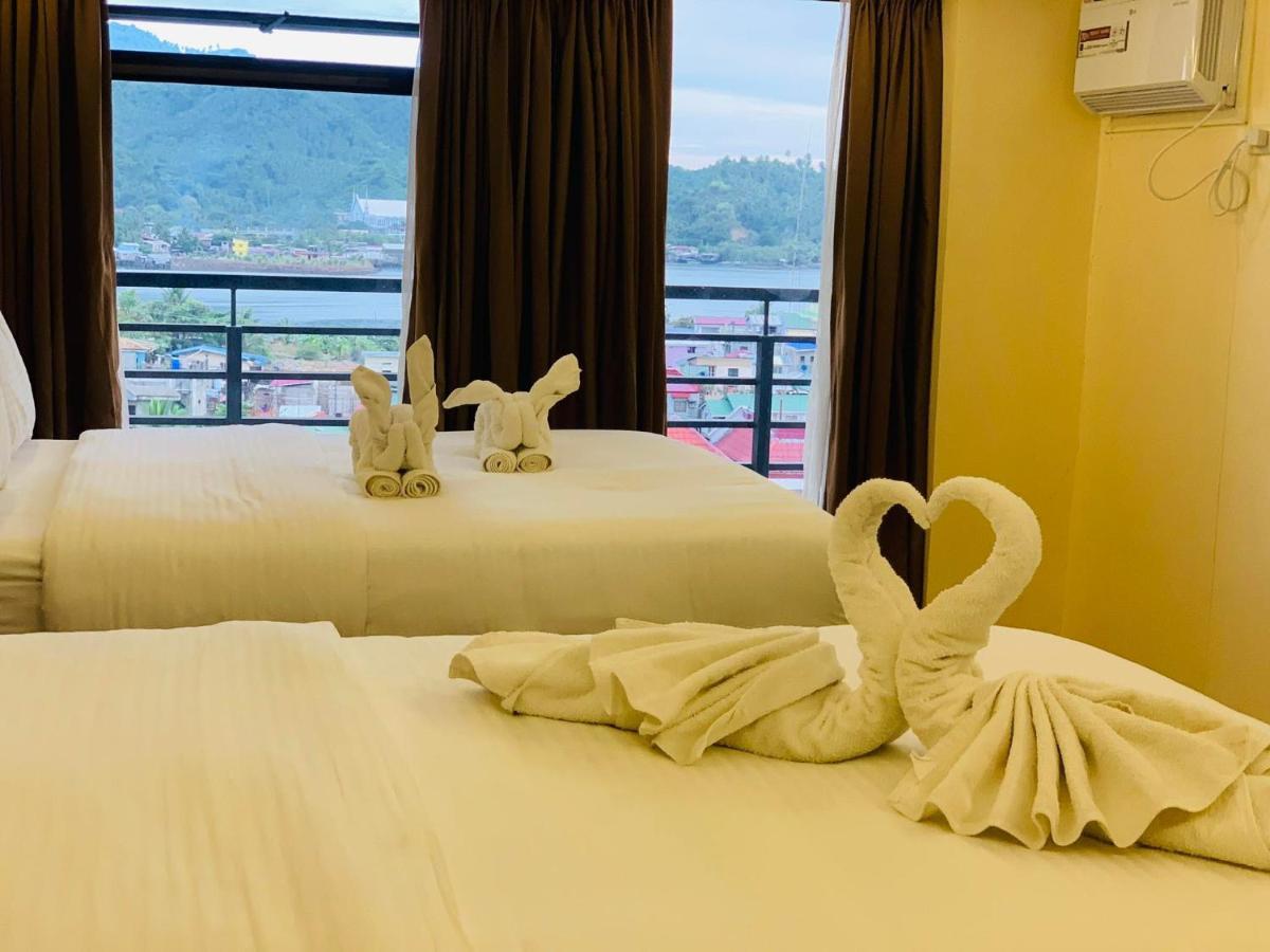 เทรชเชอร์ ไอส์แลนด์ โฮเต็ล วิธ มินิวอเตอร์ แอดเวนเจอร์ Hotel Masbate City ภายนอก รูปภาพ