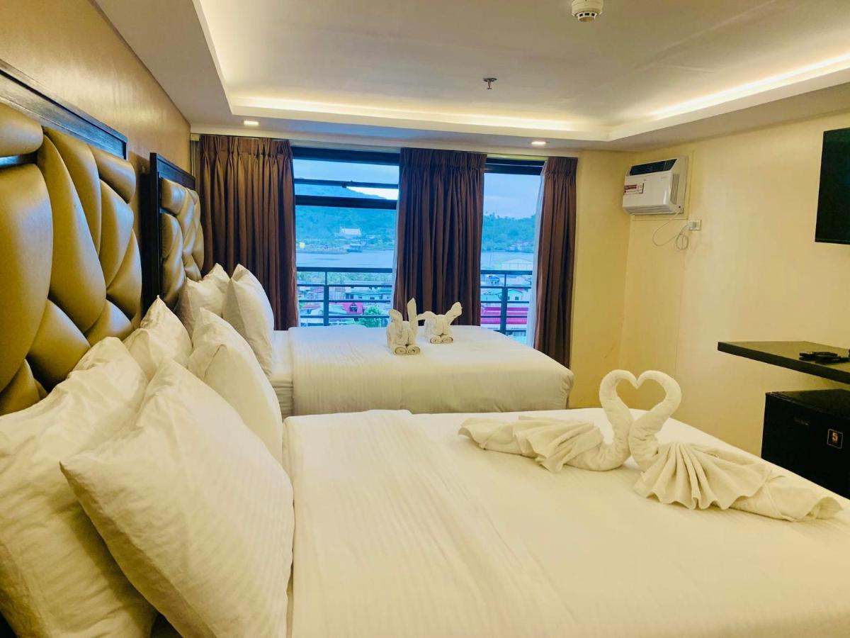 เทรชเชอร์ ไอส์แลนด์ โฮเต็ล วิธ มินิวอเตอร์ แอดเวนเจอร์ Hotel Masbate City ภายนอก รูปภาพ