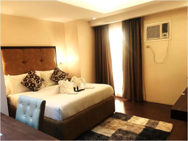 เทรชเชอร์ ไอส์แลนด์ โฮเต็ล วิธ มินิวอเตอร์ แอดเวนเจอร์ Hotel Masbate City ภายนอก รูปภาพ